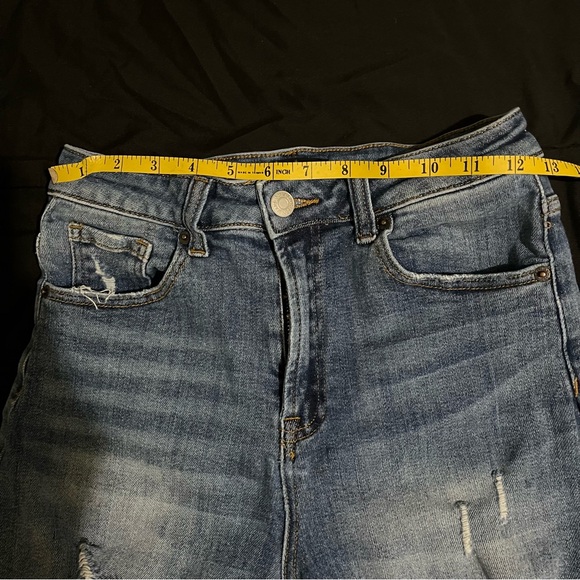 Risen high rise. Distressed jean shorts. - Picture 6 of 9